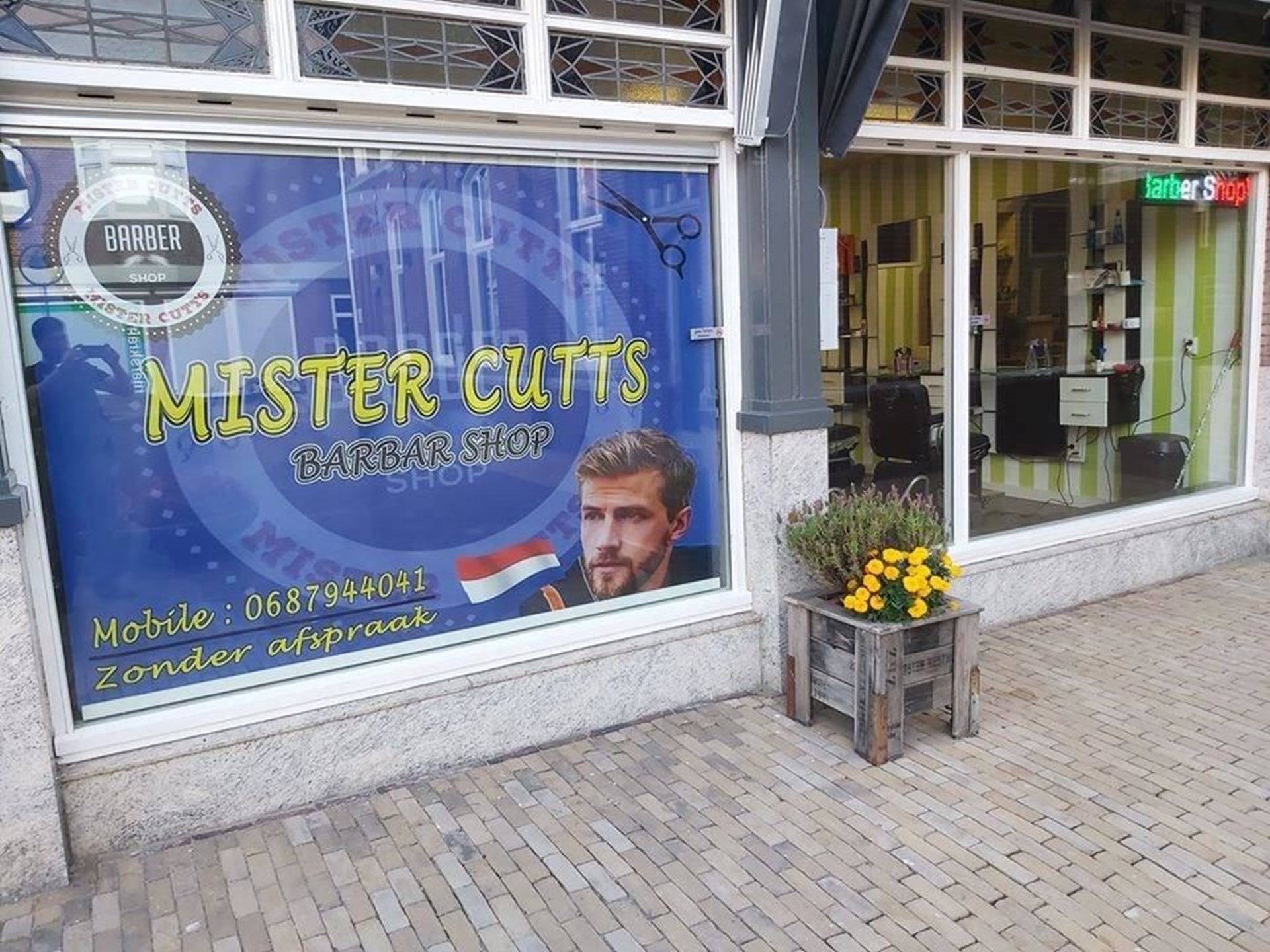 Mister Cutts Barber Shop banner